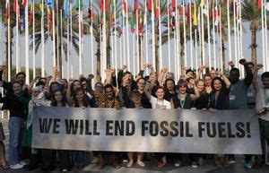 In a first, delegates at UN climate talks agree to transition away from planet-warming fossil fuels